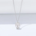 Macro shot of S925 sterling silver skull pendant with pavé cubic zirconia diamonds - 925 Silver / Silver