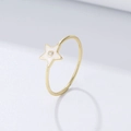 S925 Silberstern Ring in Gold mit weißem Emaille und Zirkon auf hellgrauem Hintergrund - US 5 / Weiß
