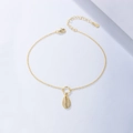 Tobillera minimalista dorada de concha con cristales sobre fondo azul claro para mujer - Plata 925 / Dorado