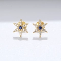Classic gold star stud earrings with blue center stone and small white zircon accents - Yellow