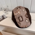 Cappello newsboy retrò in pelle marrone scuro con inserti a righe e stampe grafiche - 56-58cm / Strisce caffè