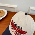 Beige and navy blue baseball cap with embroidery on a wooden table with a white plate - 56-58cm Adjustable / Beige Khaki