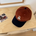Vintage corduroy baseball cap in orange and blue with a cute bear embroidery detail - Caramel