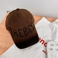 Vintage brown washed baseball cap with The Best graffiti print on wooden background - 56-59cm Regular / Coffee