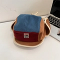 Retro color-block fleece aviator hat with blue and red panels and soft earflaps - Adult 56-58cm / Blue