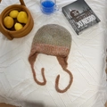 Winter knit trapper hat with multicolor gradient yarn and long braided earflaps - 56-59cm / Orange