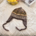 Hand-knitted purple vintage floral earflap beanie with long braided tassels for winter - 56-59cm / Brown