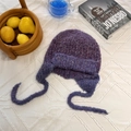 Purple bouclé knit earflap beanie for women with long tie straps for winter warmth - 56-59cm / Purple