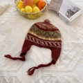 Bohemian style knitted chullo hat with burgundy patterns and earflaps for winter warmth - 56-59cm / Burgundy