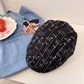 Retro black striped newsboy cap with white dog prints on a cozy minimalist desk - 56-58cm (Adjustable) / Black