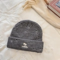 Distressed dark grey knitted beanie featuring fox embroidery and stylish ripped details - Gray