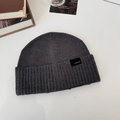 Dark grey knitted beanie hat with a minimalist woven label and ribbed edge finish - 56-58cm (Elastic) / Knitted Beanie / Dark Gray