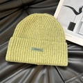 Light green ribbed knit beanie for women with a dark green leather-like brand tag - 56-62cm / Light Green