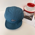 Short brim 5-panel baseball cap in teal blue with a COOL triangle patch - 56-58cm / Blue