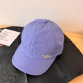 Gorra lila de visera corta con bordado 'NEVER GIVE UP' en tejido de secado rápido - 56-58cm / Azul claro