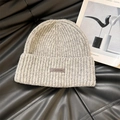 Classic grey knitted beanie featuring a leather logo patch and vertical ribbed texture - 56-62cm / Gray