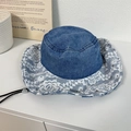 Deep blue denim bucket hat with white floral lace brim and adjustable drawcord - 56-58cm / Medium Blue & White