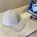 Beige quick-dry camping baseball cap with mountain logo on light wood tabletop - 56-58cm Adjustable / Beige