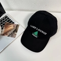 Black cotton baseball cap featuring white CAMP LOUNGE embroidery and a green tree design - 56-58cm Adjustable / Black