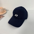 Navy blue cotton baseball cap featuring white embroidered B logo and curved brim - 56-58cm Adjustable / Navy Blue