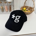 Black corduroy baseball cap featuring a white embroidered letter on a minimalist design - 56-58cm Adjustable / Black