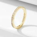 Elegante anillo eternity de oro de 18K con circonitas redondas y de tipo baguette - US 5 / Dorado