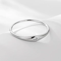 Minimalist S925 sterling silver ring featuring a single inset round diamond on white silk - US 5 / Silver