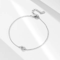 Close-up of S925 sterling silver heart bracelet with star-set zircon and lobster clasp - 925 Silver / Silver