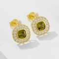 Macro shot of S925 sterling silver stamp on vintage olive green zircon stud earrings - 925 Silver / Yellow