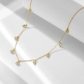 Collana in argento 925 dorato con sette pendenti in zircone scintillante su catena a O - Argento 925 / Oro