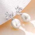 Elegant S925 silver pearl drop earrings featuring marquise zircon accents on a white base - 925 Silver / White