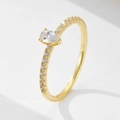 Elegant gold pear-cut zircon ring featuring a shimmering pavé-set band on a white background - US 5 / Gold