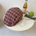 Vintage red plaid newsboy cap in Scottish tartan cotton on a minimalist white table - 56-58cm Adjustable / Burgundy