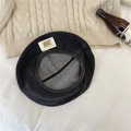 Vintage black denim beret with NK patch detail shown flat on an autumn sweater - 56-58cm / Black