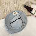 Light blue denim beret hat with a vintage wash and a decorative cream leather tag - 56-58cm / Light Blue
