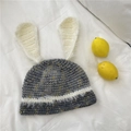 Dark grey knitted beanie with white bunny ears and faux fur trim for winter style - 56-59cm / Light Gray