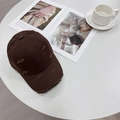 Retro distressed dark coffee baseball cap with frayed holes on a stylish table - 56-59cm (Adjustable) / Coffee