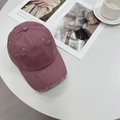 Distressed vintage baseball cap in dusty pink with ripped details on a white table - 56-59cm (Adjustable) / Dusky Pink