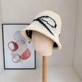 Woven bucket hat in cream knit with black abstract patterns and breathable hollow design - 56-58cm / Off White