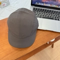 Dark grey five-panel ripstop nylon camper hat with short brim shown on wooden desk - 56-59cm (Adjustable) / Coffee