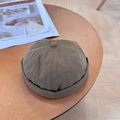 Vintage dark brown docker hat with twill texture and retro brim on a wooden surface - 56-58cm Adjustable / Coffee