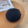 Minimalist black brimless docker hat in quick-dry fabric on a wooden background - 56-58cm Adjustable / Black