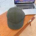 Olive green five-panel camping cap in ripstop nylon fabric on a wooden table - 56-59cm (Adjustable) / Army Green