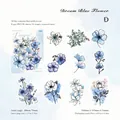 Pegatinas de flores azules en PET mate con relieve 3D en oro negro para diario - Pétalos Azules de Ensueño