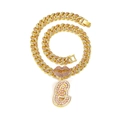 Macro view of gold-plated Cuban chain with pink rhinestone lip and number 8 pendant - Gold Letter E