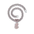 Close-up of hip hop Cuban link chain with pink rhinestone lips and letter S pendant - Silver Letter E