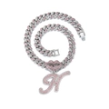 Close-up of hip-hop silver Cuban chain with pink lip pendant and letter A rhinestones - Silver Letter H