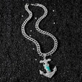 Iced out silver Saint Jude anchor pendant with green enamel and Cuban chain on black stones - Saint Jude Anchor Pendant + Cuban Chain / Silver