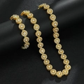Dettaglio di set collana e bracciale a girasole dorato con brillanti cristalli di zirconia - Set bracciale + collana a catena veneziana / Oro