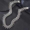 Macro di catena cubana argentata con punte ricoperta di strass bianchi e chiusura a incastro - Catena Cubana a Spine Argento